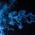Blue smoke on black