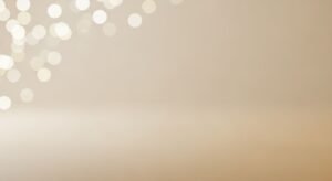 Beige background with bokeh lights on it Background Image