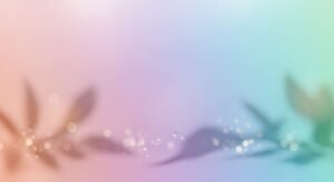 Blurry image of a flower on a pink and blue background Background Image