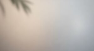 Blurry image of a palm tree in the fog Background Image