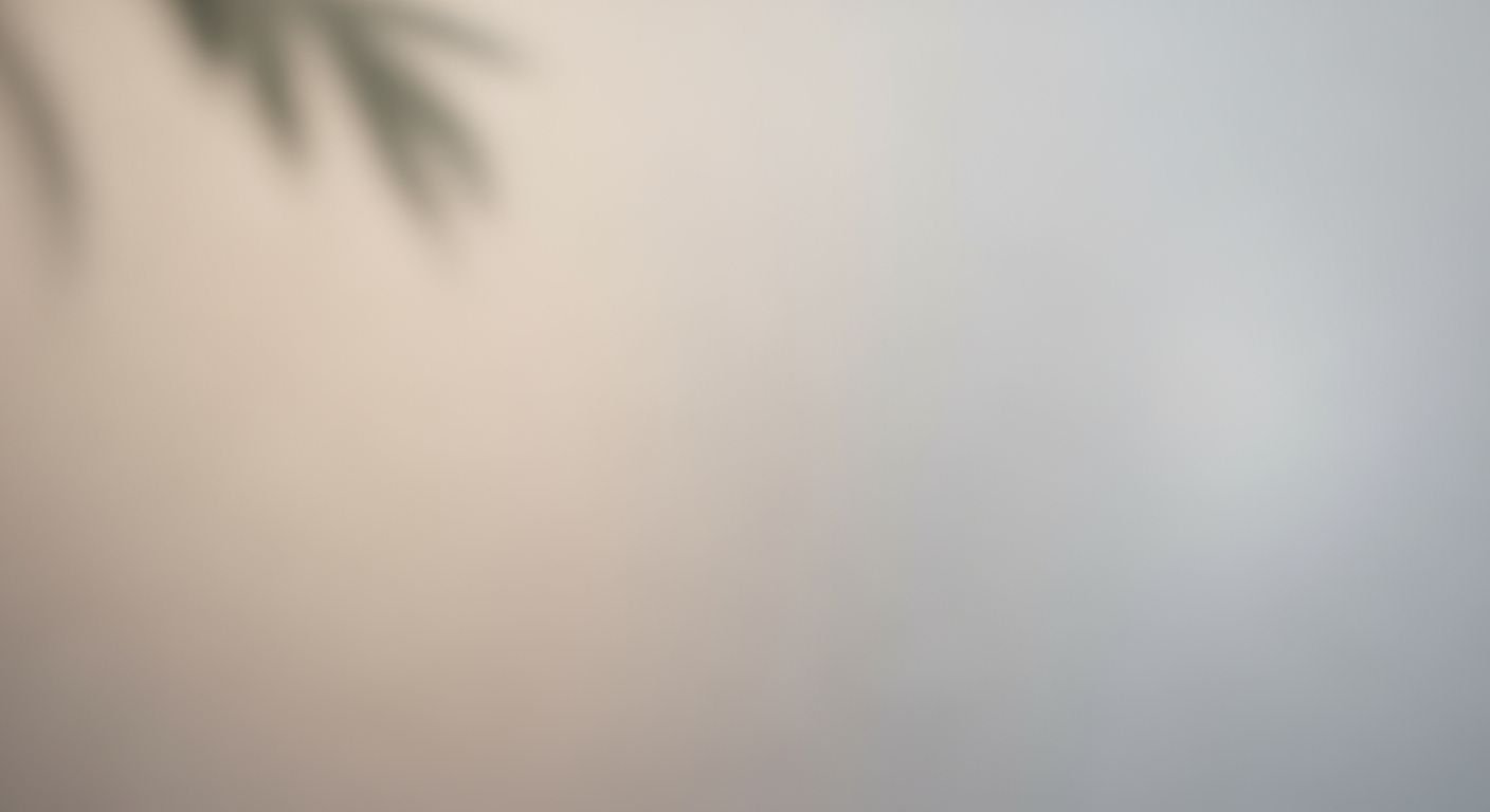 Blurry image of a palm tree in the fog Background Image