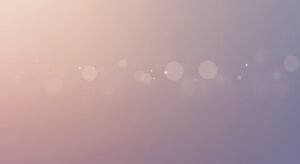 Blurry image of a pink and purple background Background Image