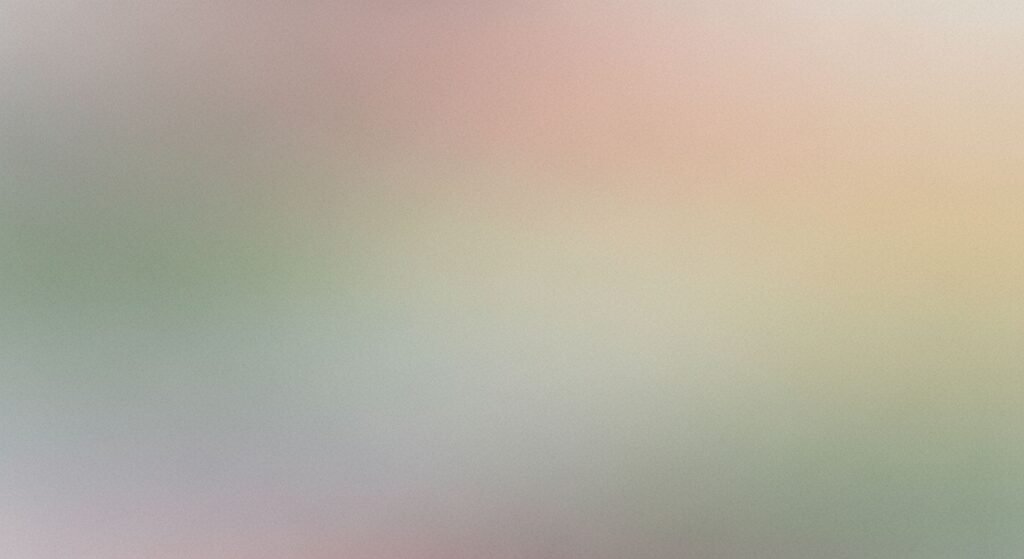 Blurry image of a pink and green background Background Image