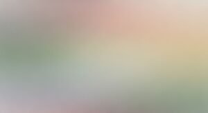 Blurry image of a pink and green background Background Image