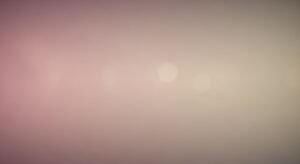 Blurry image of a pink and white background Background Image