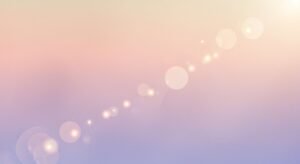 Blurry image of a sunset with bokeh lights Background Image