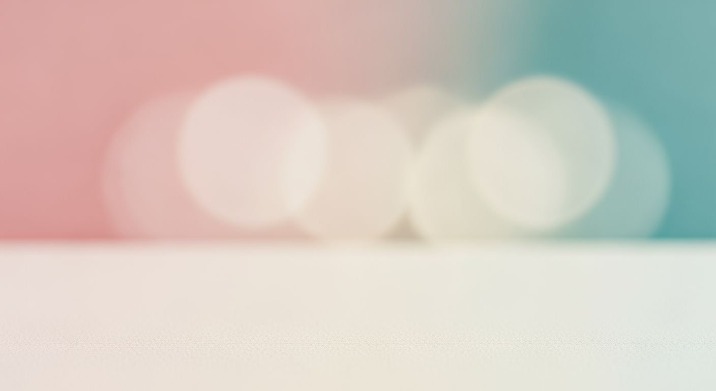 Blurry image of a white table with a pink and blue background Background Image