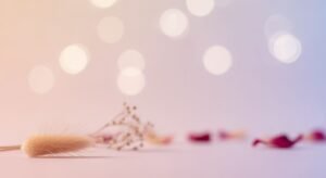 Bunch of dried flowers sitting on top of a table Background Image