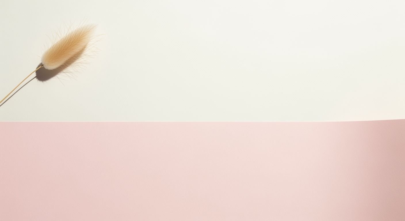 Close up of a feather on a pink and white background Background Image