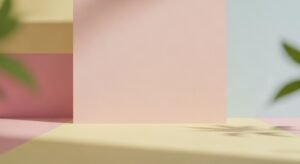 Pink and yellow wall with a plant in the corner Background Image