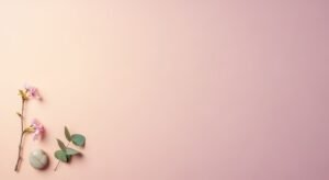 Pink flower and a marble on a pink background Background Image