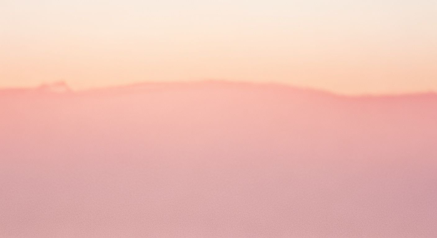 Pink sky with a few clouds in the background Background Image