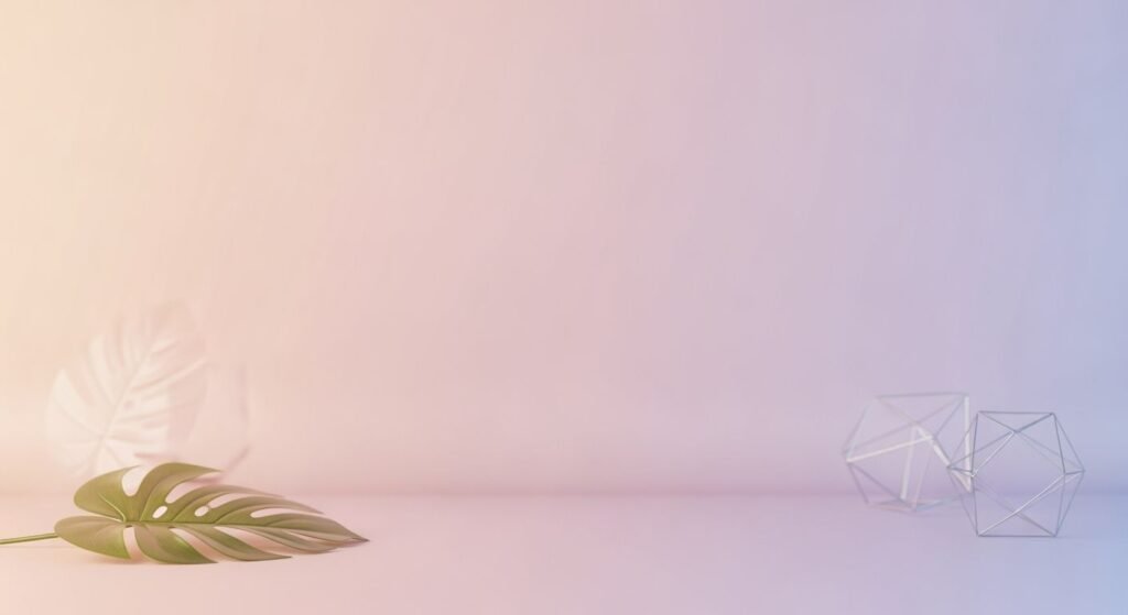 Plant and a glass vase on a table Background Image