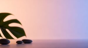 Plant and three stones on a table with a pink background Background Image