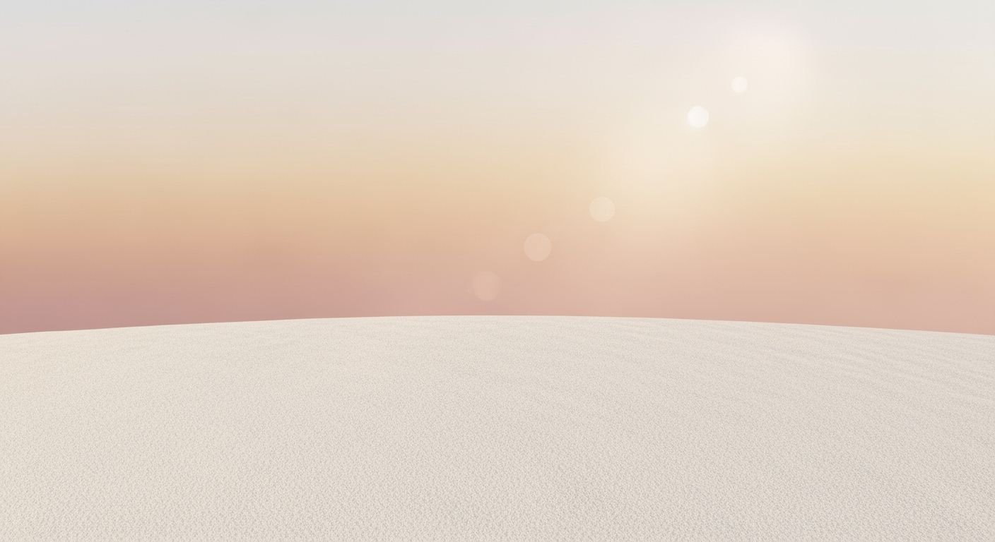 Sand dune with the sun setting in the background Background Image