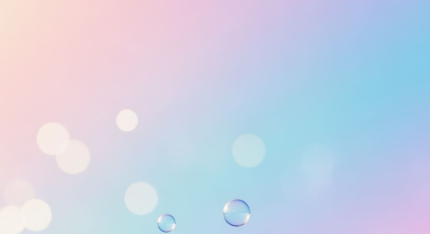 Three soap bubbles floating in the air on a blue and pink background Background Image