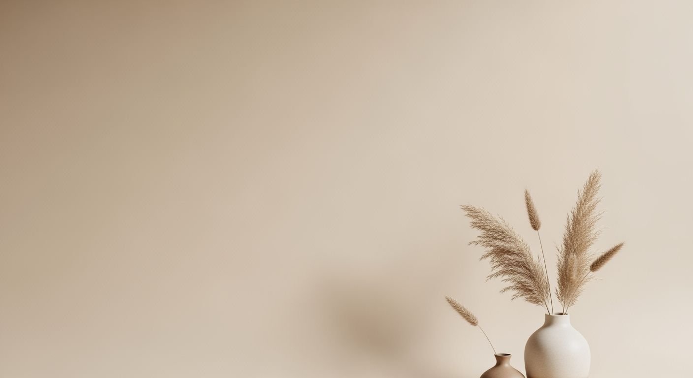 Two vases with pampas grass in them sitting on a table Background Image