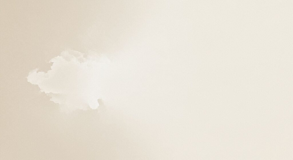 White cloud in the middle of a beige sky Background Image