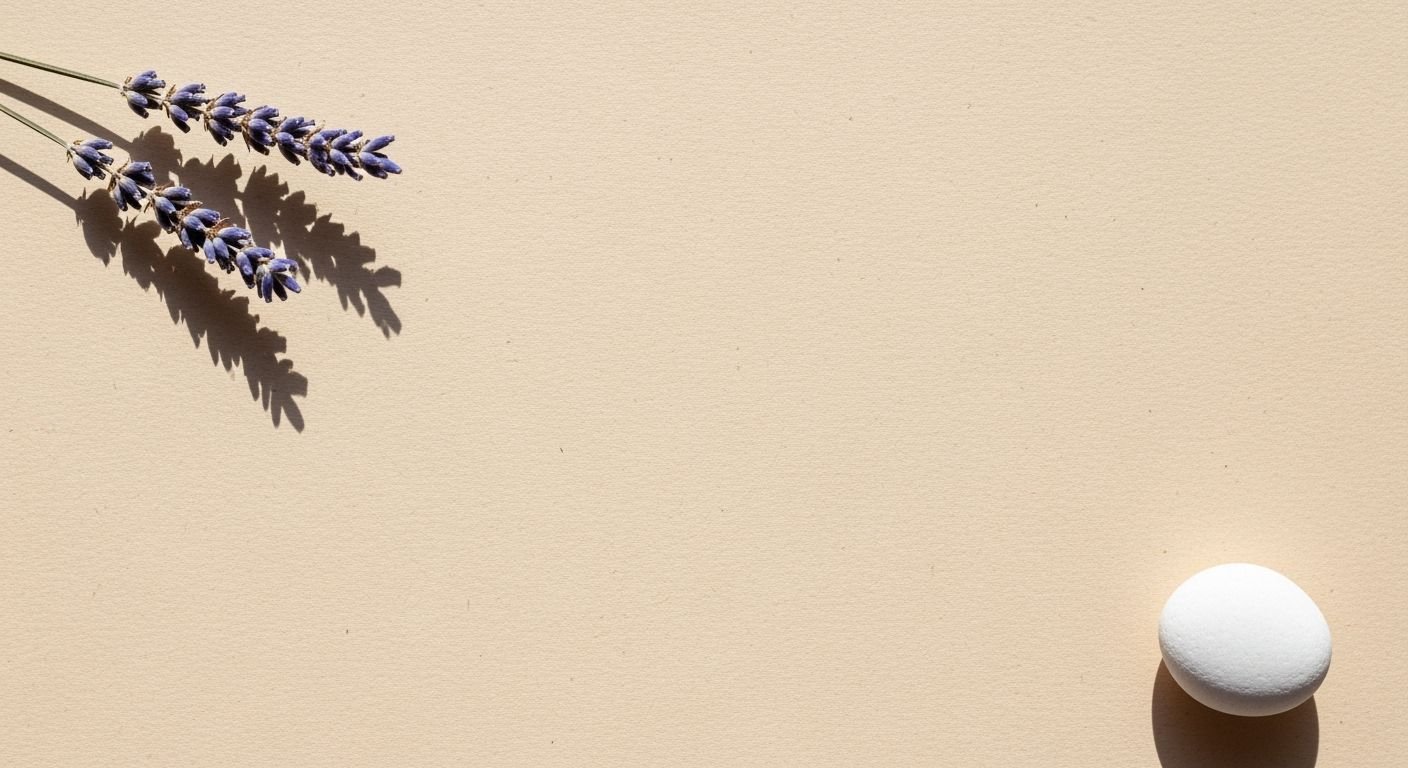White egg sitting next to a bunch of lavender flowers Background Image