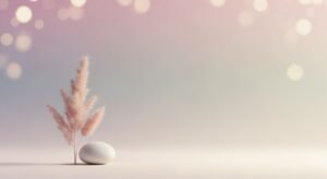 White egg sitting on top of a table next to a plant Background Image