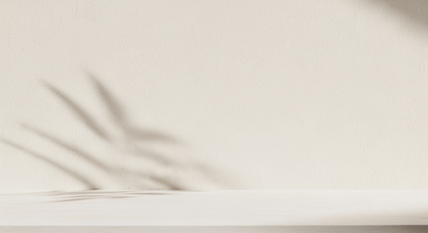 White shelf with a shadow of a plant on it Background Image