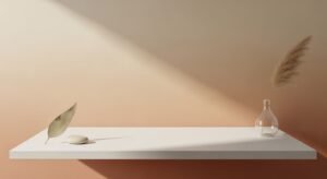 White shelf with a vase and a leaf on it Background Image