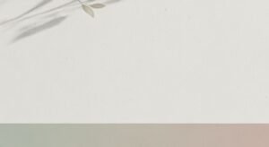 White wall with a green leaf on it Background Image