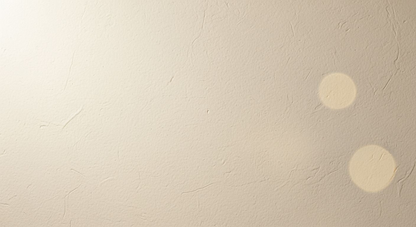 White wall with two circles painted on it Background Image