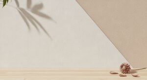 Wooden table with a plant on top of it Background Image